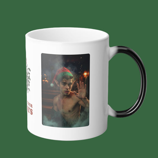White mug with a printed design of a shirtless elf in a red/green hat on a white background