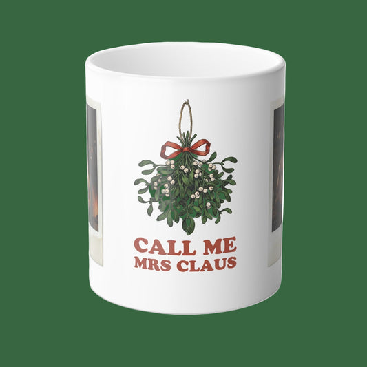 Mug with mistletoe design and text 'Call Me Mrs Claus' on a white background